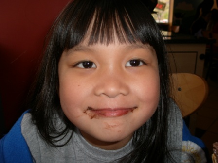 Kasen with a chocolate ice cream mouth